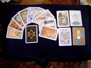 Таро Тота: Младшие Арканы Таро - Двойка динариев (Григорий Зайцев)